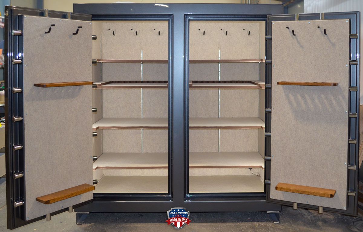 100 gun capacity double door safe with center post. Interior with both long gun racks and shelves.