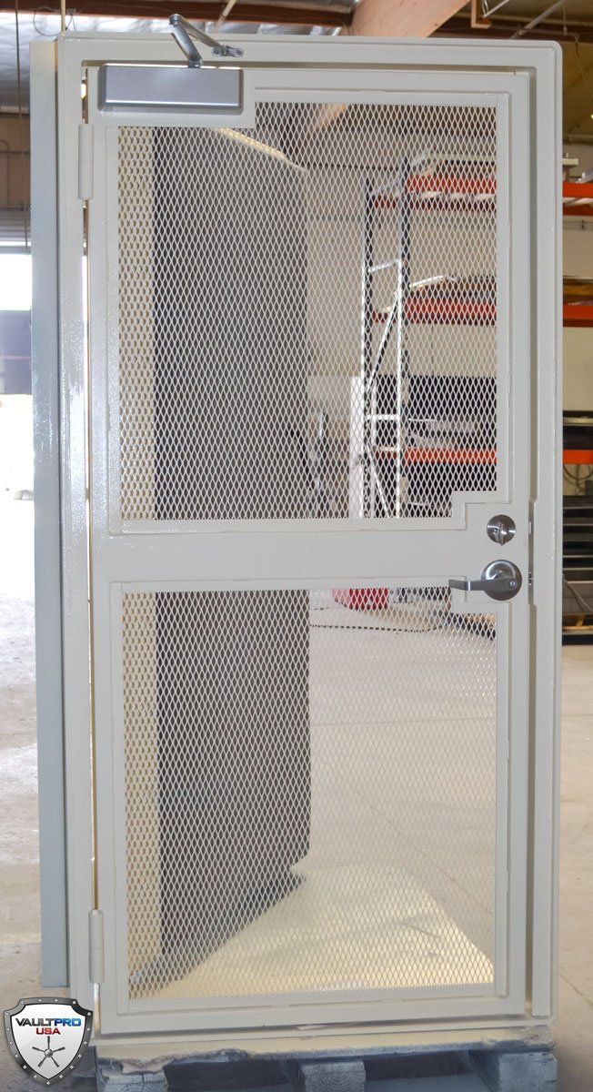 Day gates for secure pass thru in vault door rooms