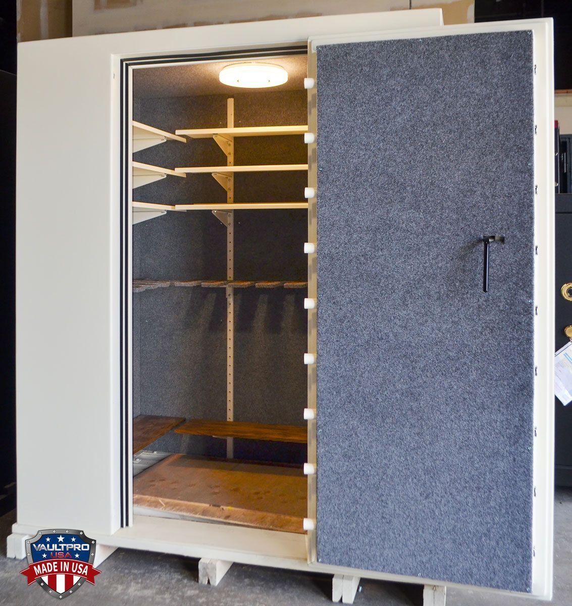 Defender Walk-In Vault with standard Elite model door open to show interior.