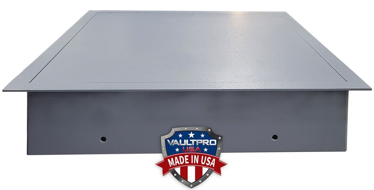 Gray metal roof vent with a flat sloped cover and a small “Made in USA” badge below