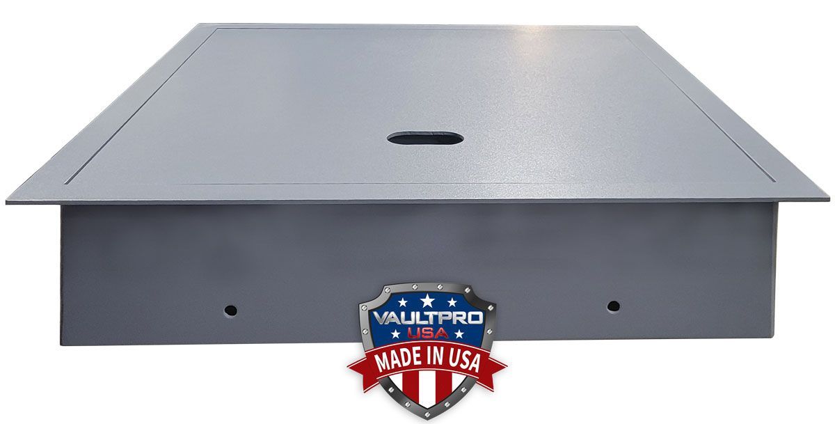 Gray metal roof vent cap with a center opening and an American-made badge on the front