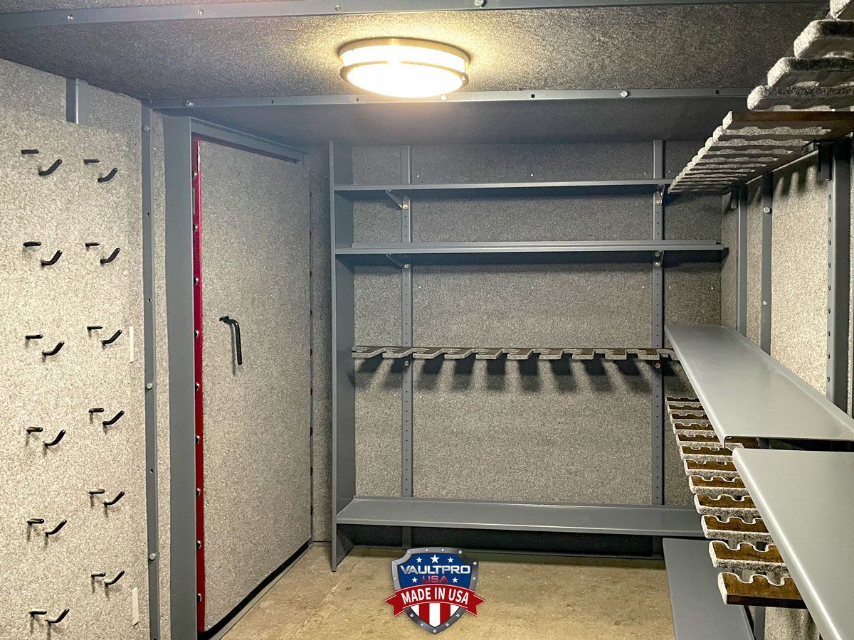 Small storage room with shelves, hanging racks, and a ceiling light, viewed through an open doorway.