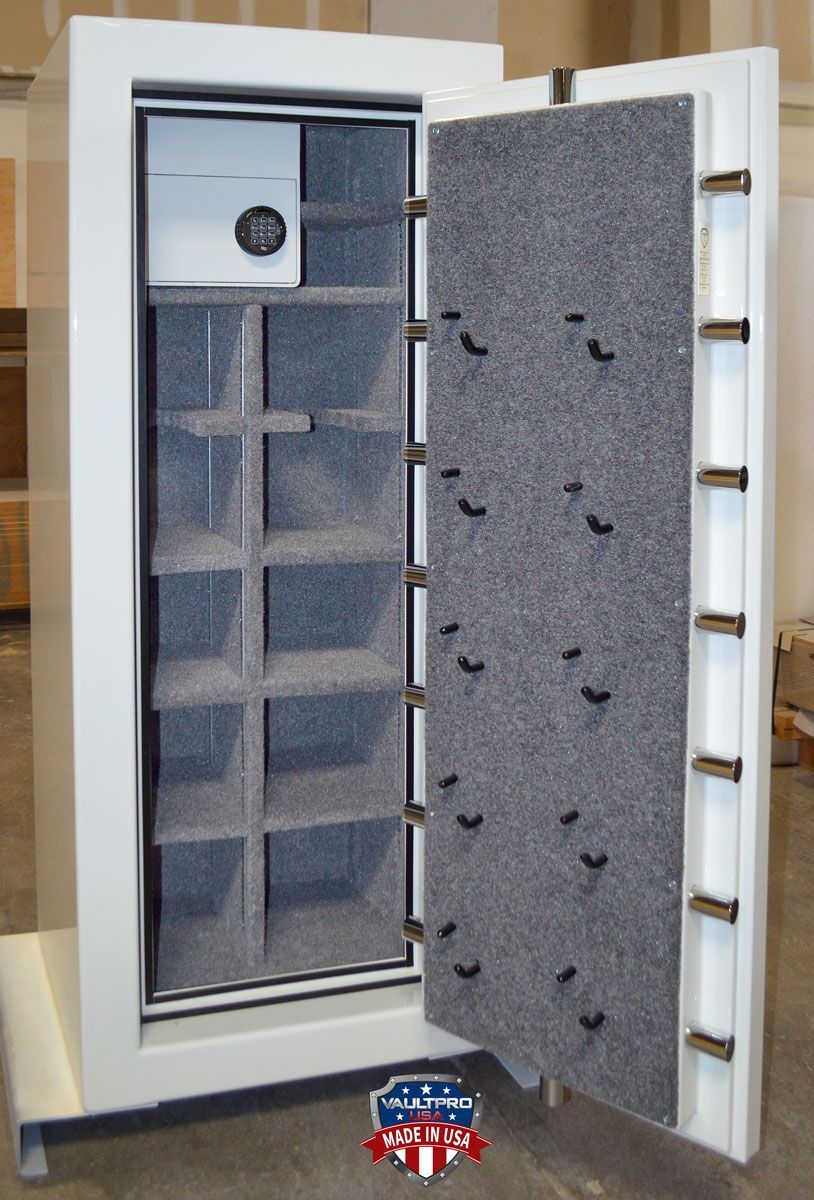 Custom mid-size safe interior with safe in safe and pistol peg handgun holders. Finished in diamond white gloss finish. Made in USA by Vault Pro