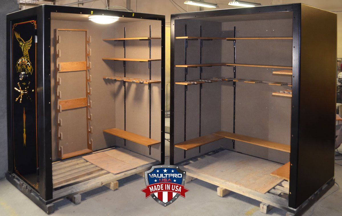 custom walk in vault room with oak gun racks
