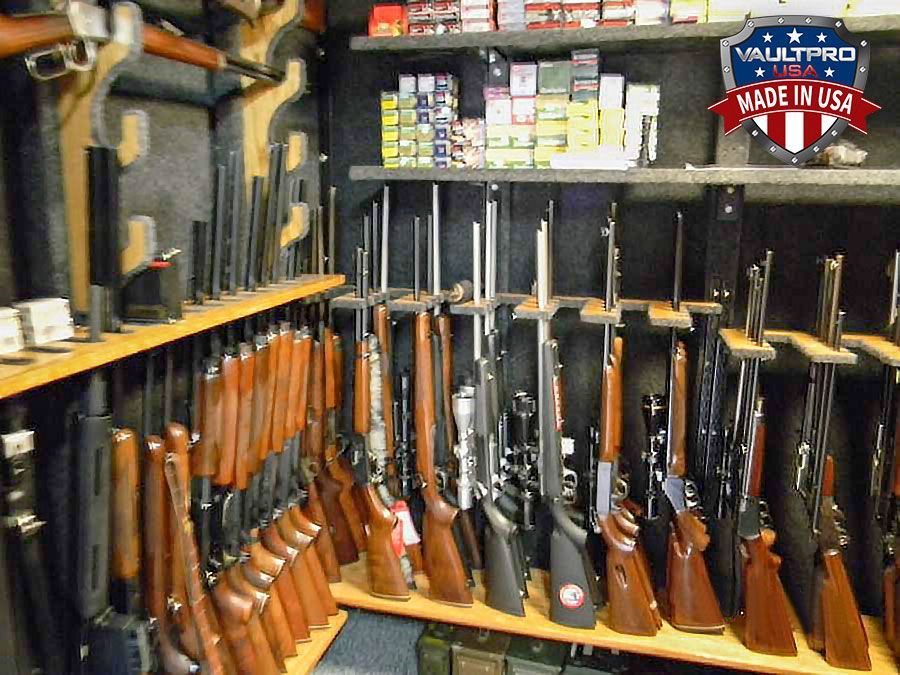 Walk in vault room with rifle racks and shelves for ammunition and accessories