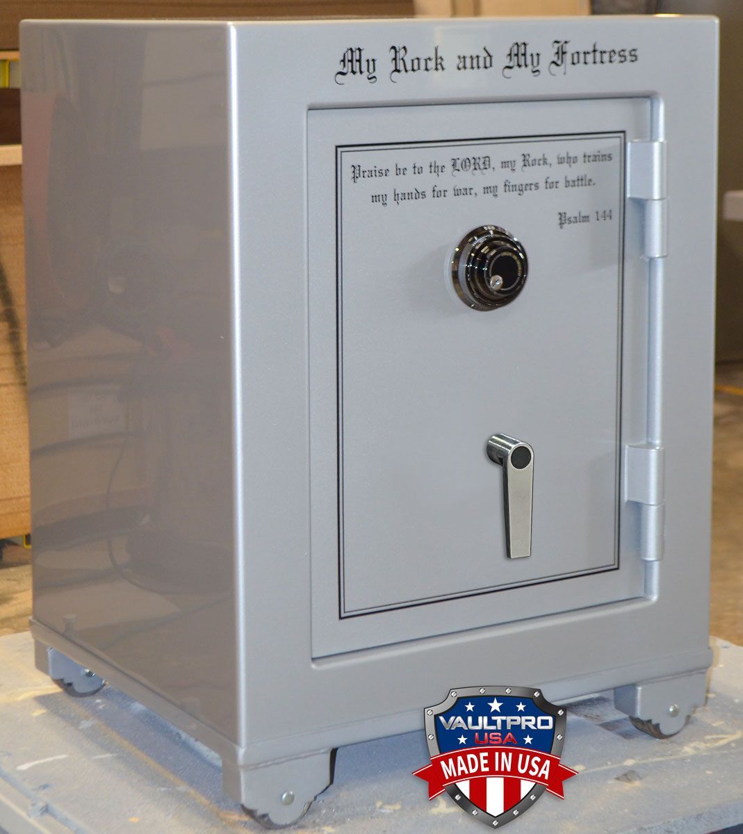 Silver safe with a combination dial and handle, labeled “My Rock and My Fortress.”