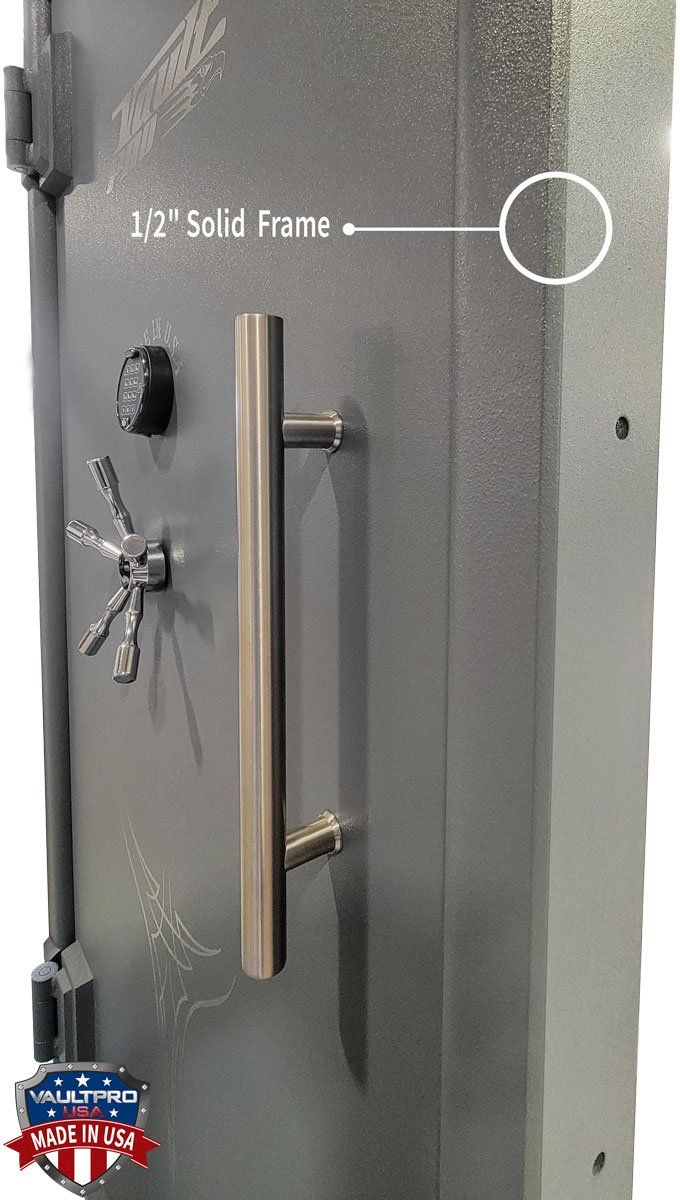 Gray metal safe door with large handle and dial lock, labeled “1/2