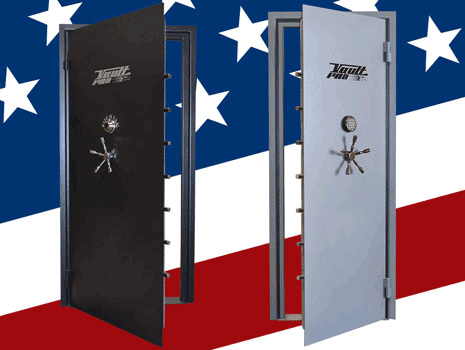 Two gun safes, one black and one silver, on a red, white, and blue background
