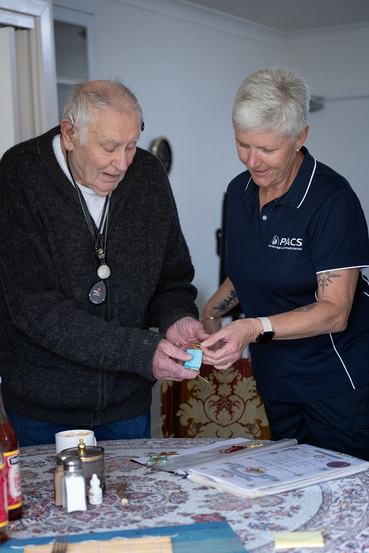 Caregiver Helping Senior Man With Medication, Indoors — Premium Aged & Community Services In Tamworth, NSW