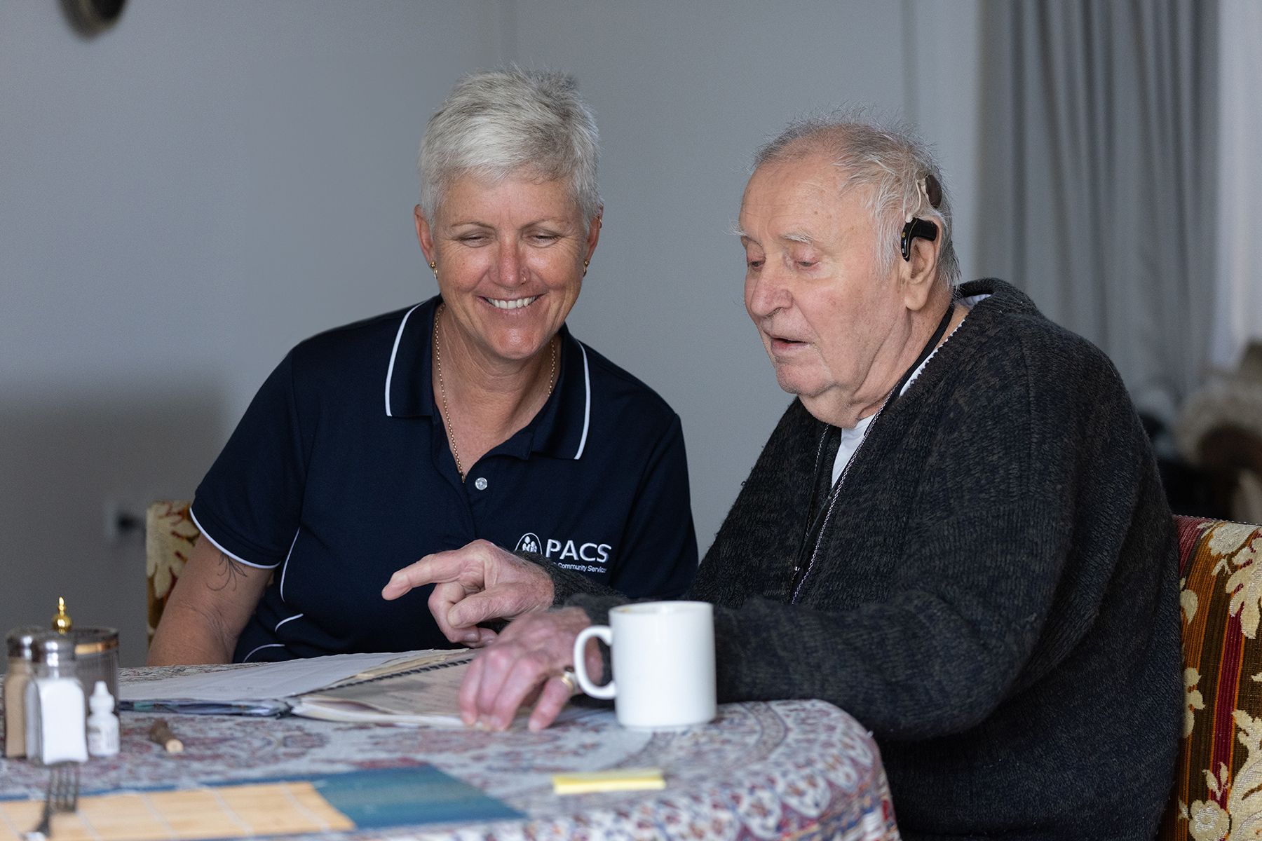 Elderly Female Hand Holding Hand Of Young Caregiver — Aged Care in Tamworth, NSW