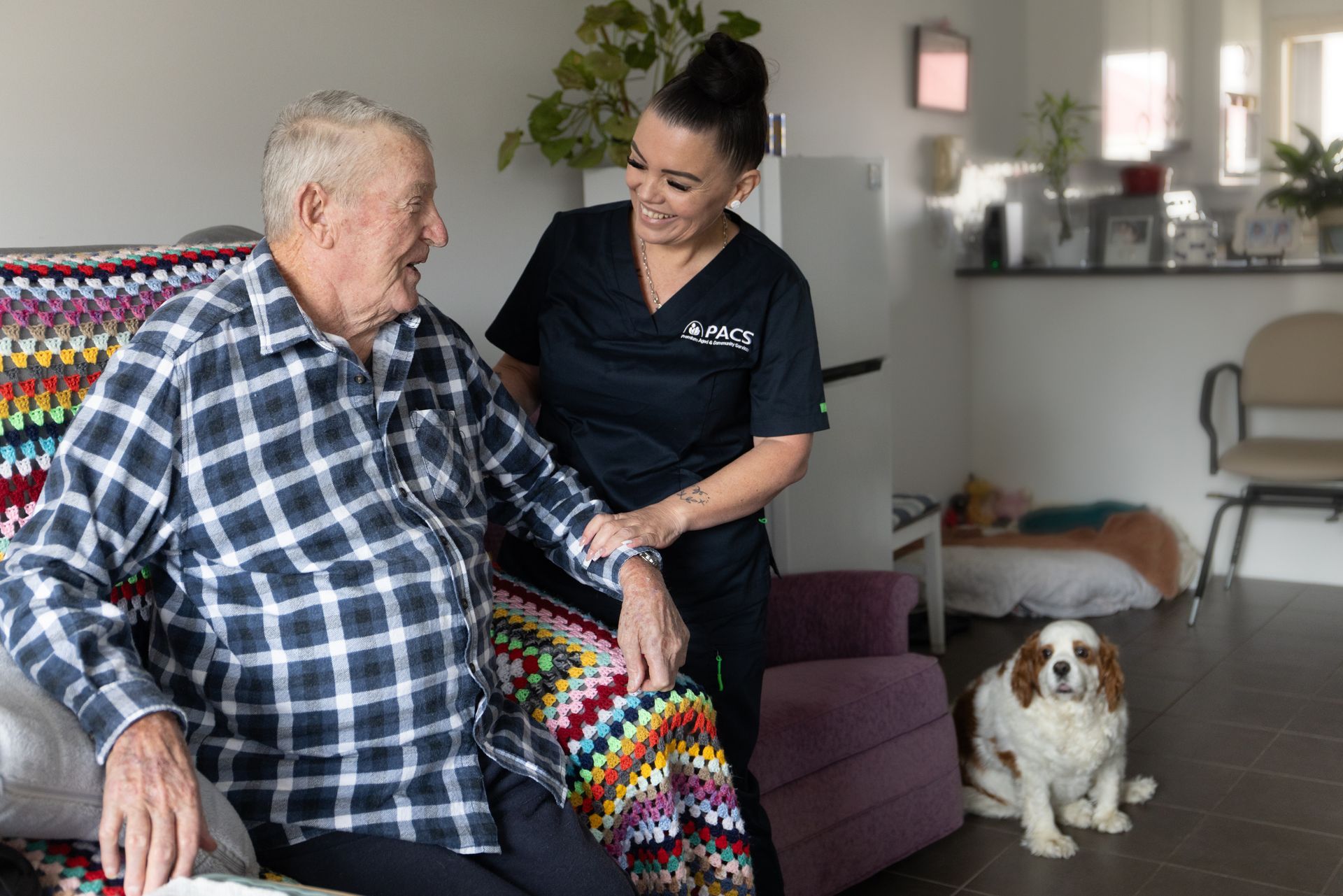 Caregiver Assists an Older Adult — Premium Aged & Community Services In Tamworth, NSW
