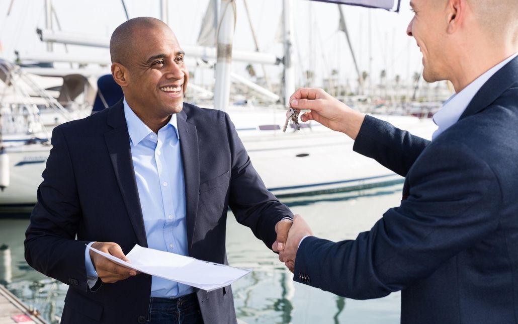 Image of a person buying a boat. Image of a person buying a boat.