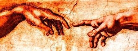 A painting of two hands touching each other on a wall.