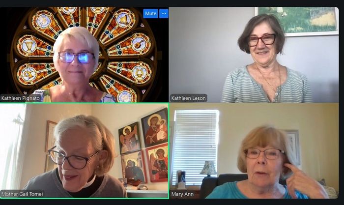 Four people in a video call. Two have stained glass backgrounds, one has religious icons. All are looking at the camera.