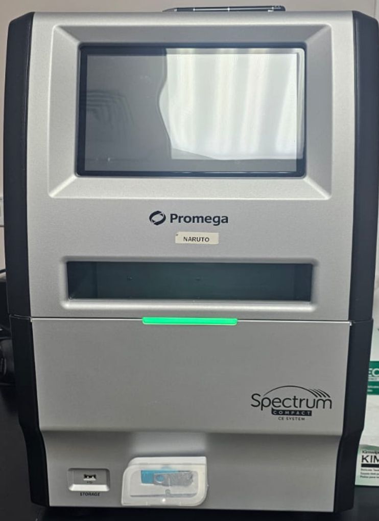 A promega spectrum machine is sitting on a table