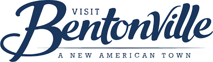 Visit Bentonville logo in dark blue script. “A New American Town” below.