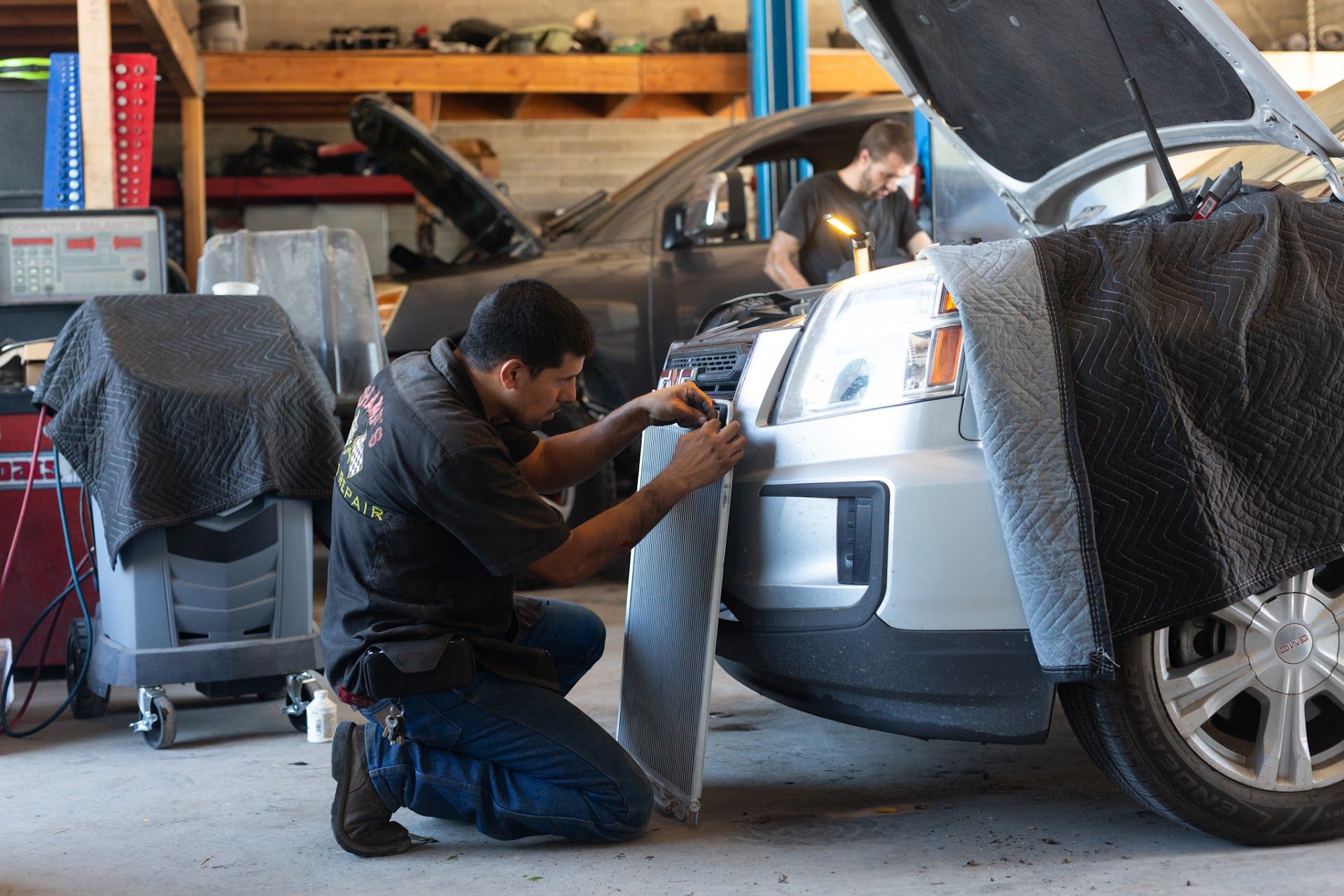 Technician Performing Auto Repair Service | Champs Auto Repair