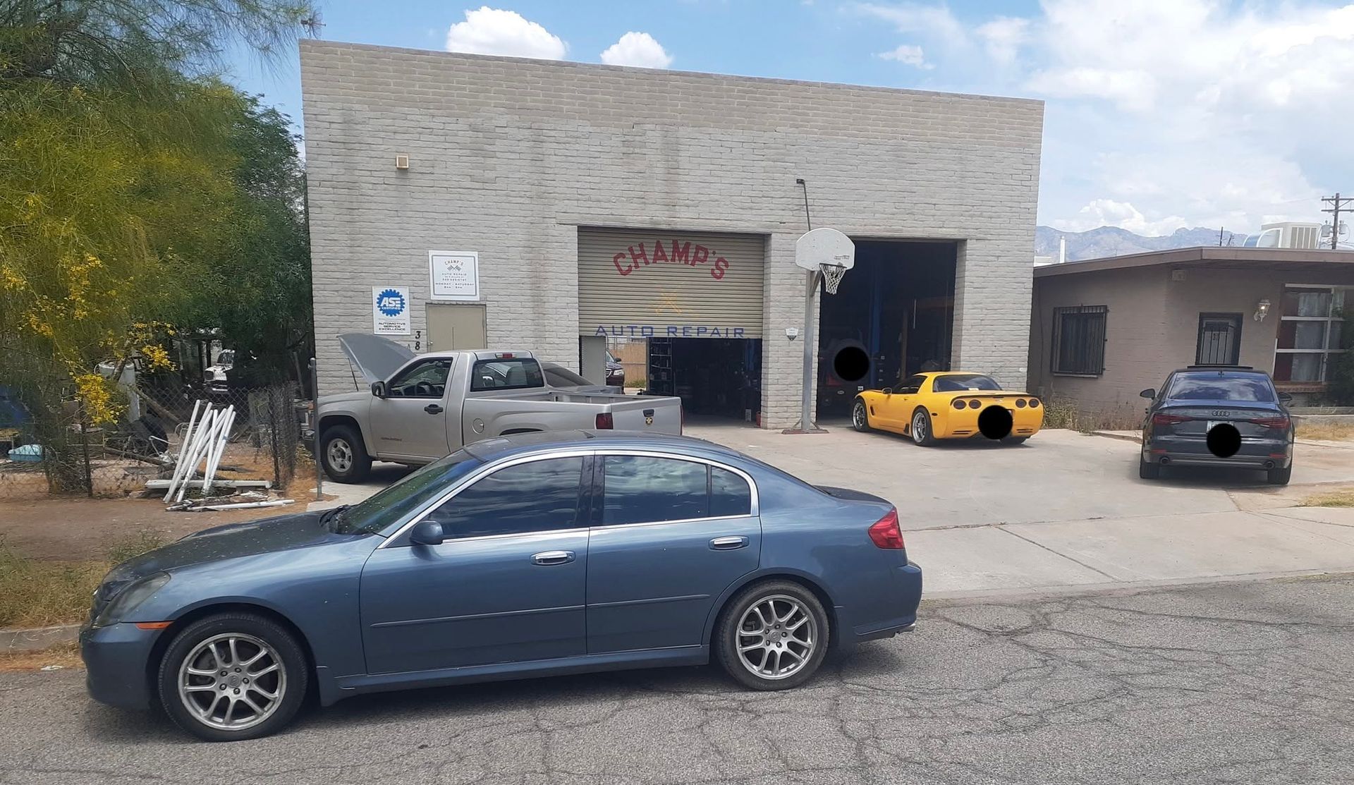 Champs Auto Repair Building And Customer Vehicles In Tucson, AZ | Champs Auto Repair