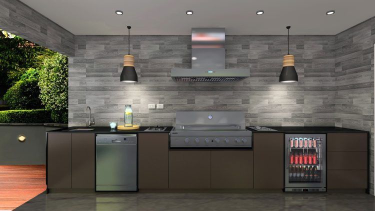 Outdoor kitchen with stainless steel appliances, brown cabinets, stone wall, and pendant lights.