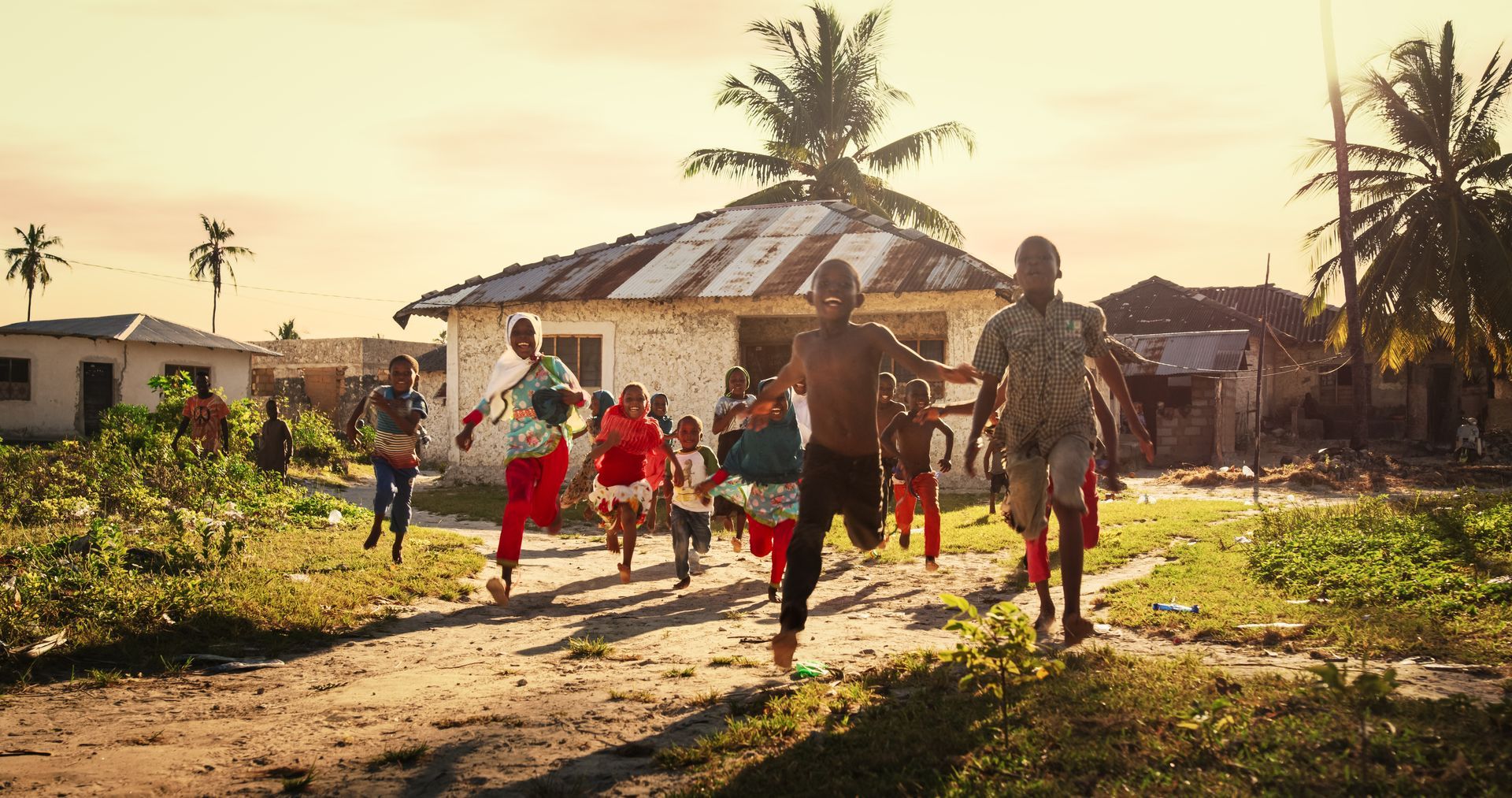 happy children running on the field