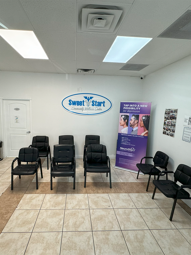 A waiting room with chairs and a sign that says smart start