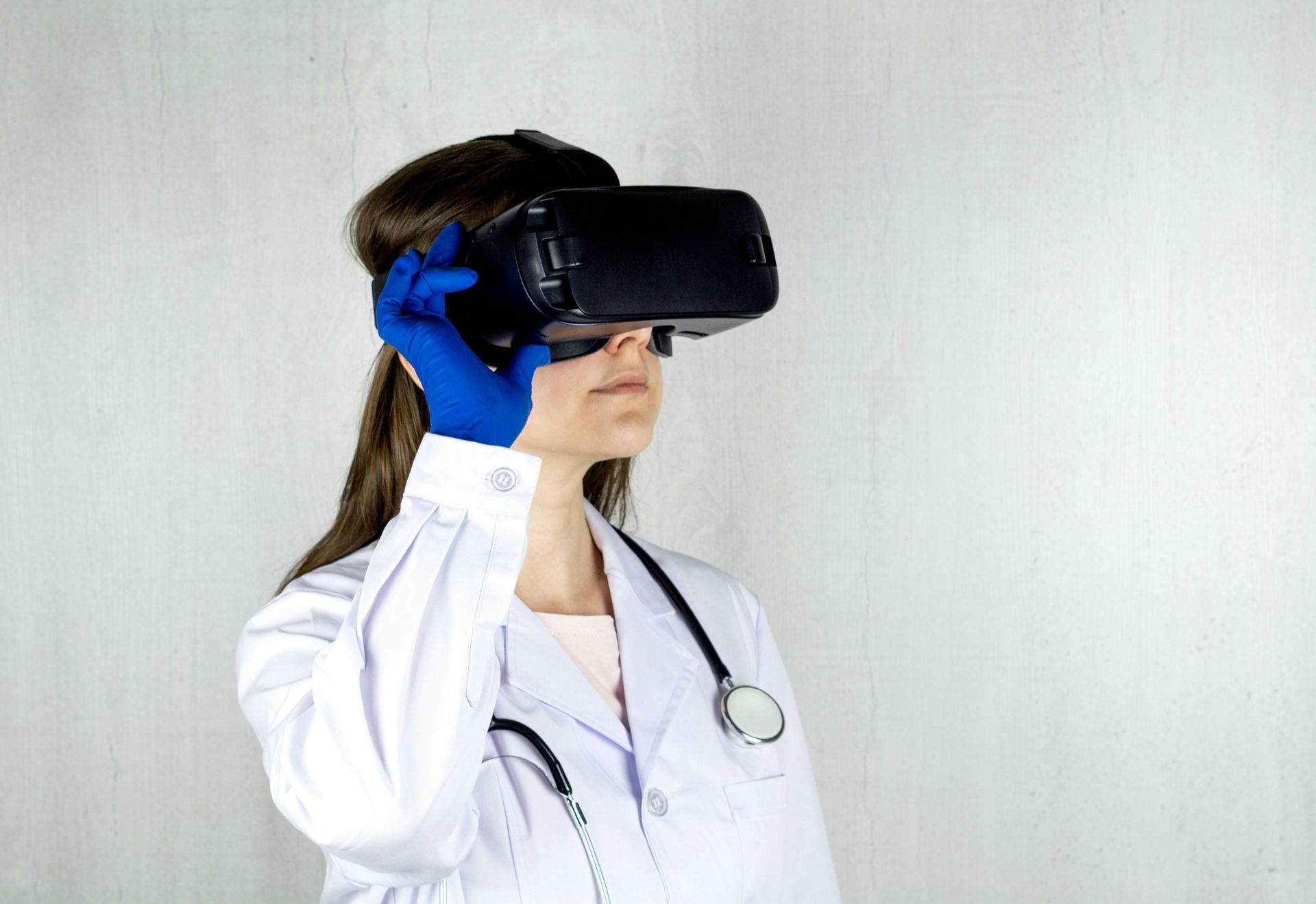 female doctor using a VR headset