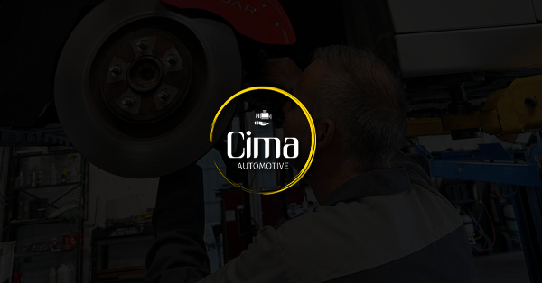 Santin Auto & Truck Repair Center logo over a mechanic working on a truck tire; blue background.