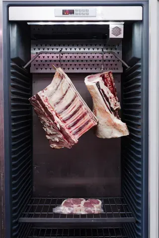 Dry-aging Meat in a Refrigerated Cabinet — Lighthouse Meat & Poultry In Port Macquarie, NSW