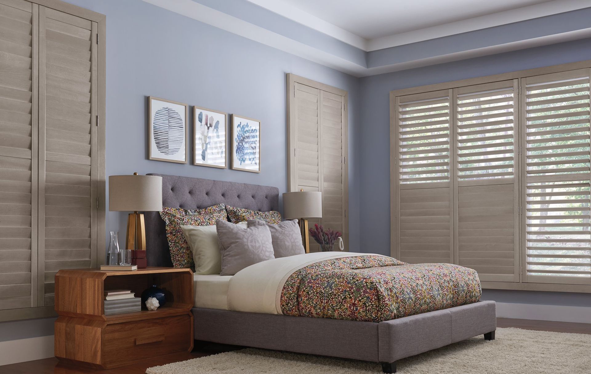 Graber hardwood shutters for master bedroom windows.