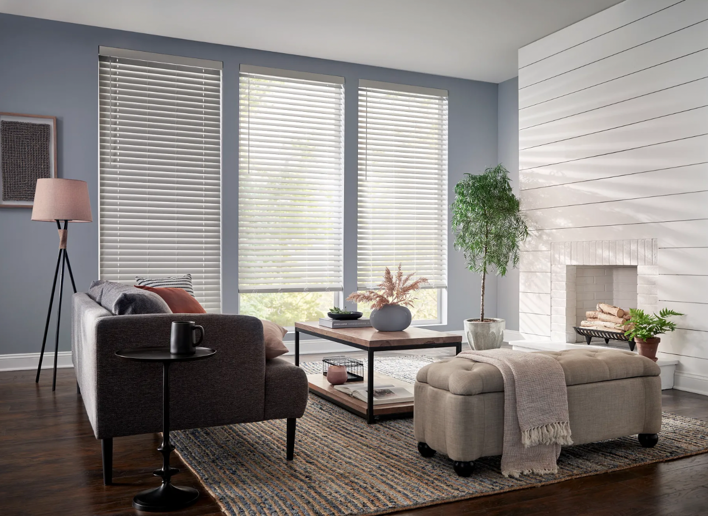 White Composite Wood Blinds in Coastal living room for Moisture resistance.