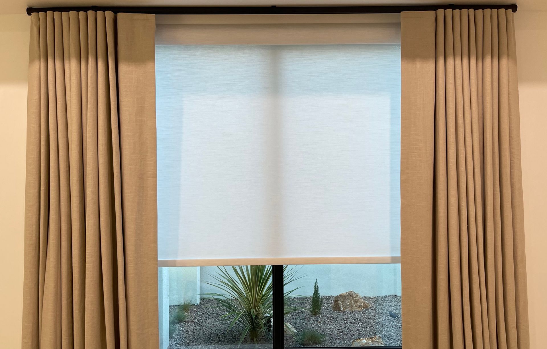 roller shade with blackout drapery curtains