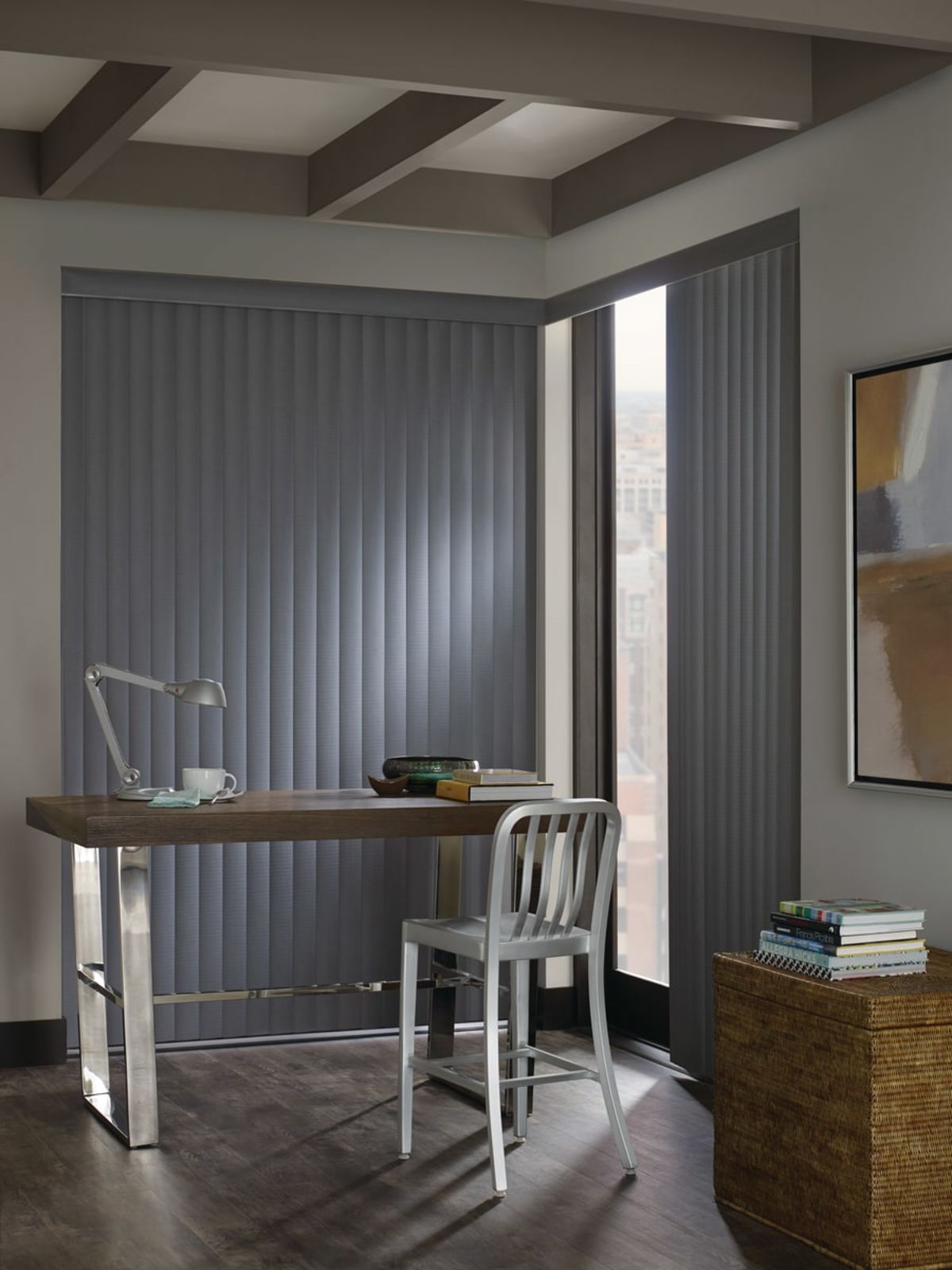 Dark grey vertical blinds provide light control for San Diego, CA Office area.