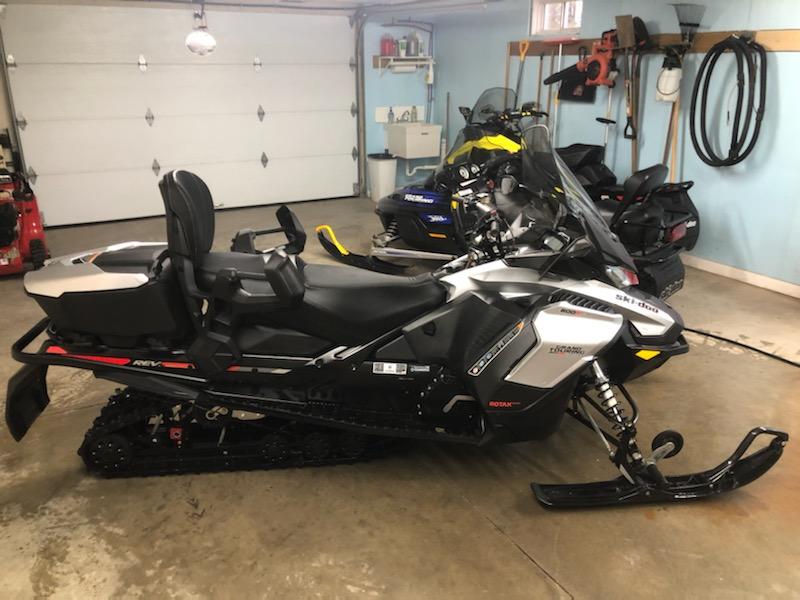 Snowmobile track cleaning