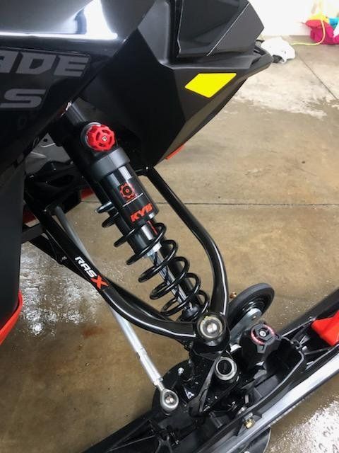 Snowmobile suspension cleaning
