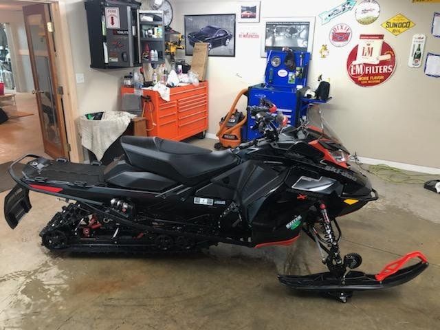 Snowmobile spray protectant