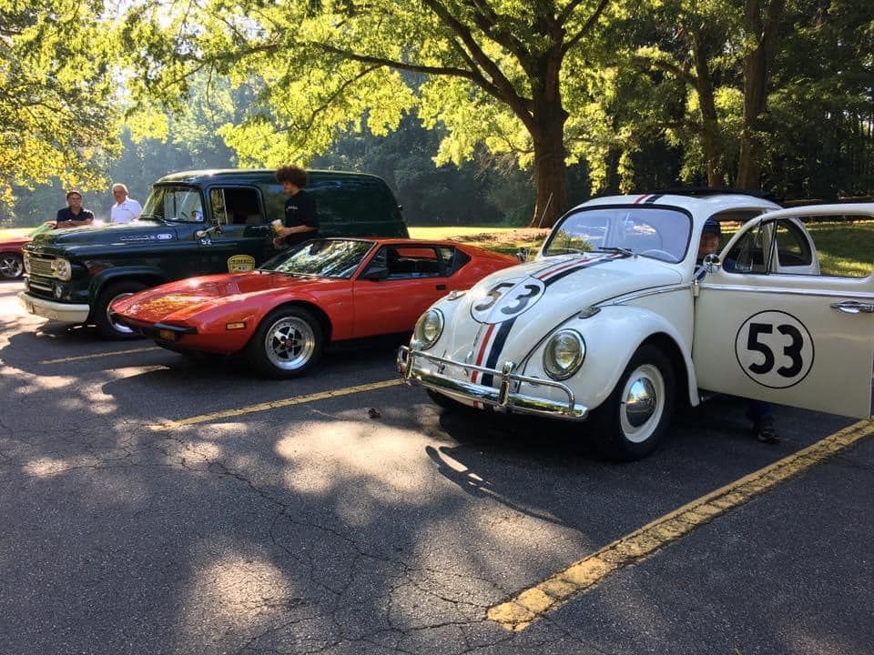 Classic VW bug, sports car, and utility vehicle