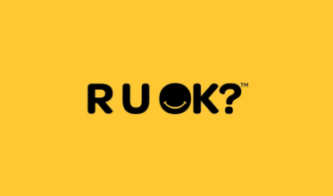 A yellow background with the word ruok on it