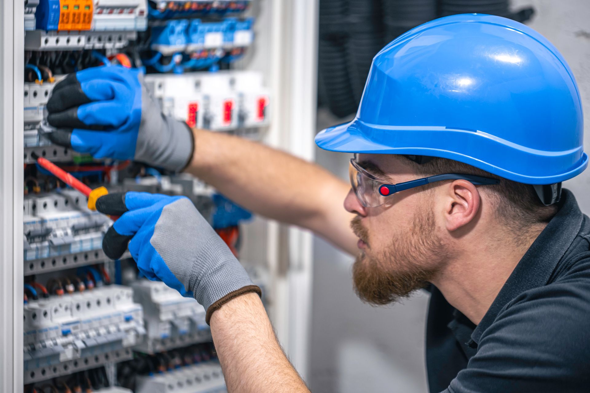 Electrician Connecting Electrical Cable — Runcorn, QLD — Runcorn Electrical Services Pty Ltd