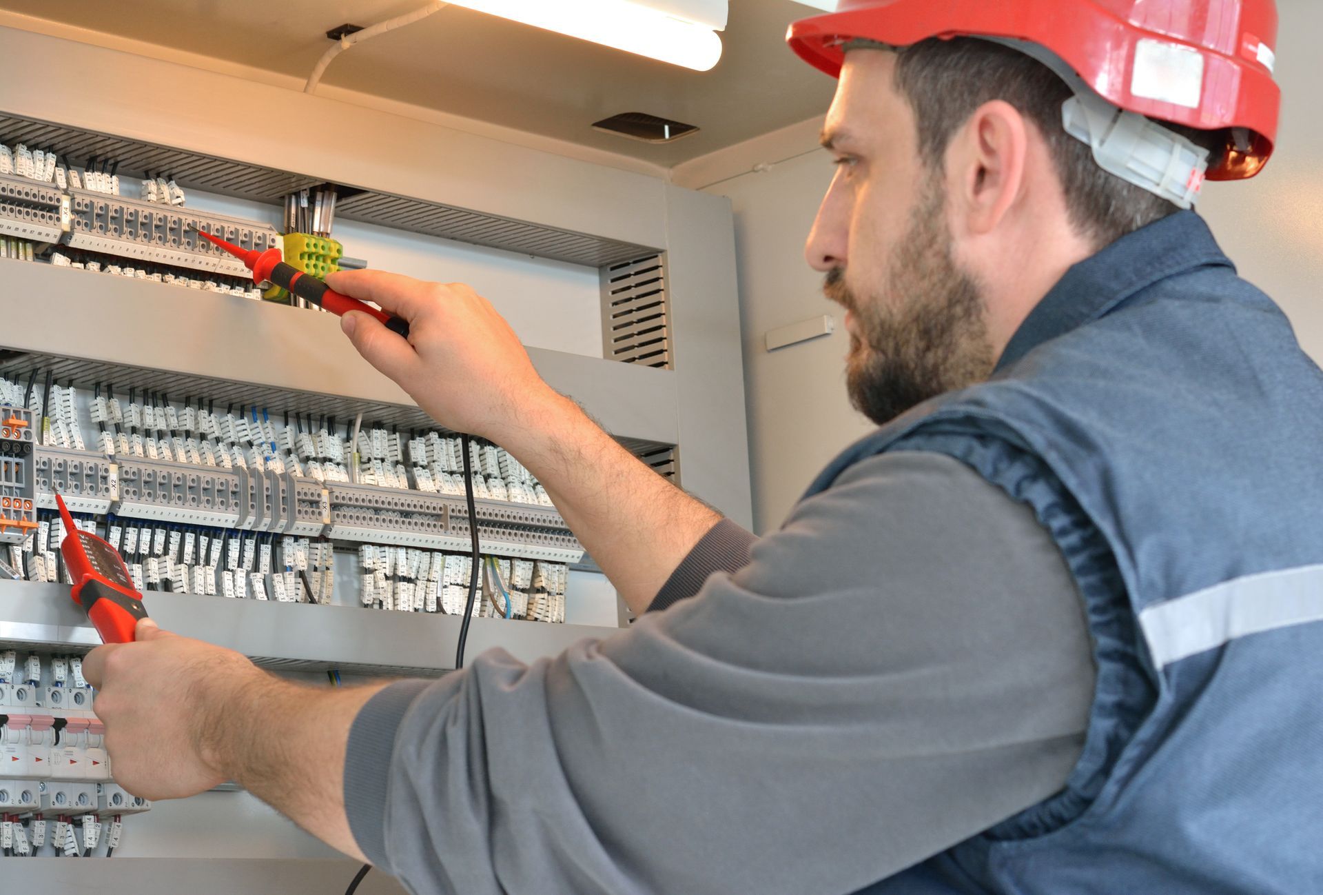 Electrician Testing The Voltage — Runcorn, QLD — Runcorn Electrical Services Pty Ltd