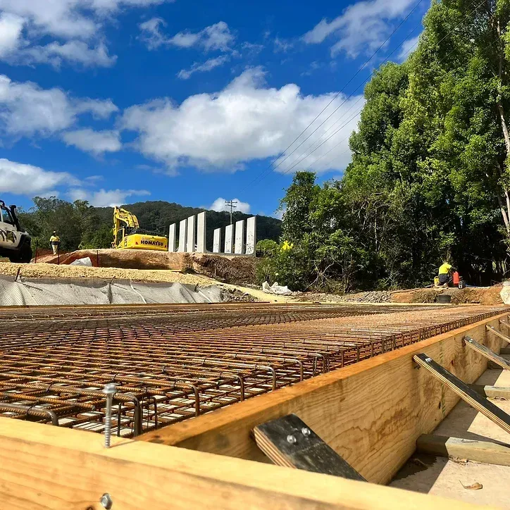 A Group of Construction Workers Are Working on A Building Under Construction — ZBM Constructions in Wollongbar, NSW