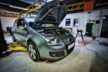 car engine and parts under hood bonnet