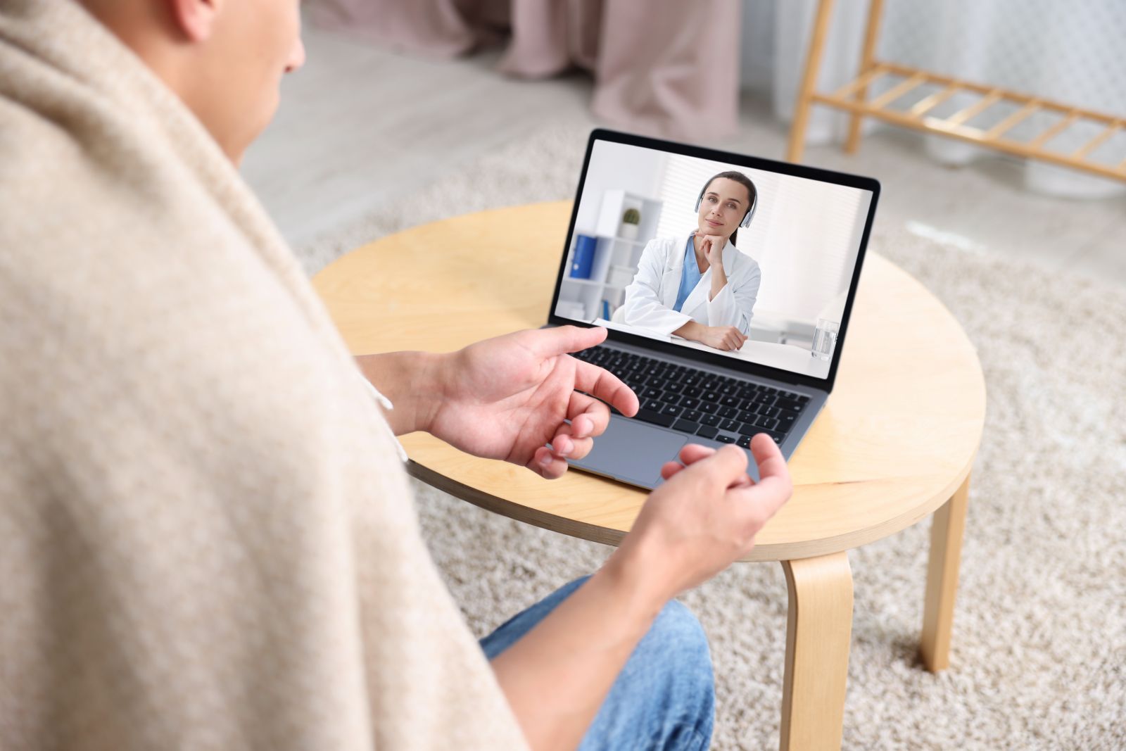 patient having a telehealth consultation with his doctor