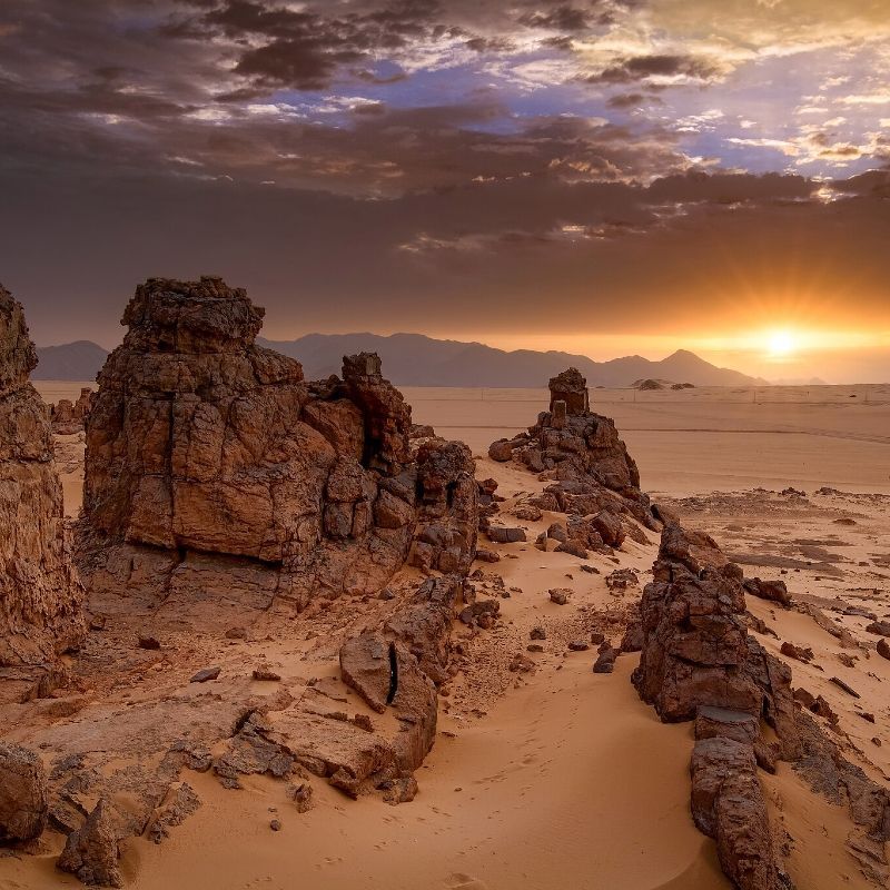 Experience the vast beauty of Algeria’s Sahara Desert with this striking image of sweeping sand dunes glowing beneath the sun. The photo captures the elegant curves, shifting textures and golden tones of the desert landscape, revealing the serene yet powerful character of one of the world’s most iconic wildernesses. From wind-sculpted ridges to endless horizons, the scene showcases the timeless majesty and quiet solitude that define the Algerian Sahara.
Inspiration Africa crafts tailor-made journeys to Algeria, offering travellers the chance to explore the Sahara’s dramatic dunes, discover desert culture and experience the captivating landscapes of North Africa’s greatest sand sea.