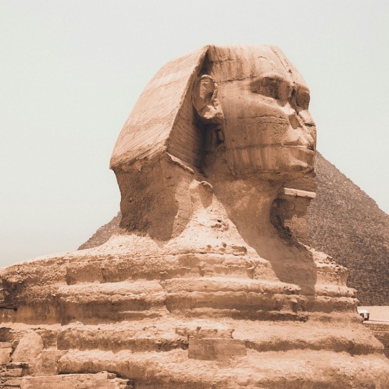 The iconic Great Sphinx of Giza, located near the Pyramid of Khufu (Kheops) in Egypt, is captured in this striking travel photograph. Carved from limestone over 4,500 years ago, the Sphinx—with its lion’s body and human head—stands as a timeless symbol of ancient Egyptian civilization, power, and artistry. Set against the desert sands and nearby pyramids, the monument reflects both the engineering genius and spiritual significance of Egypt’s Old Kingdom. Ideal for history enthusiasts, culture lovers, and photographers, visiting the Great Sphinx offers an unforgettable journey into one of the world’s most legendary archaeological sites. Inspiration Africa specializes in bespoke, tailor-made journeys to Egypt and across Africa, crafting authentic travel experiences that bring iconic monuments and ancient heritage to life.