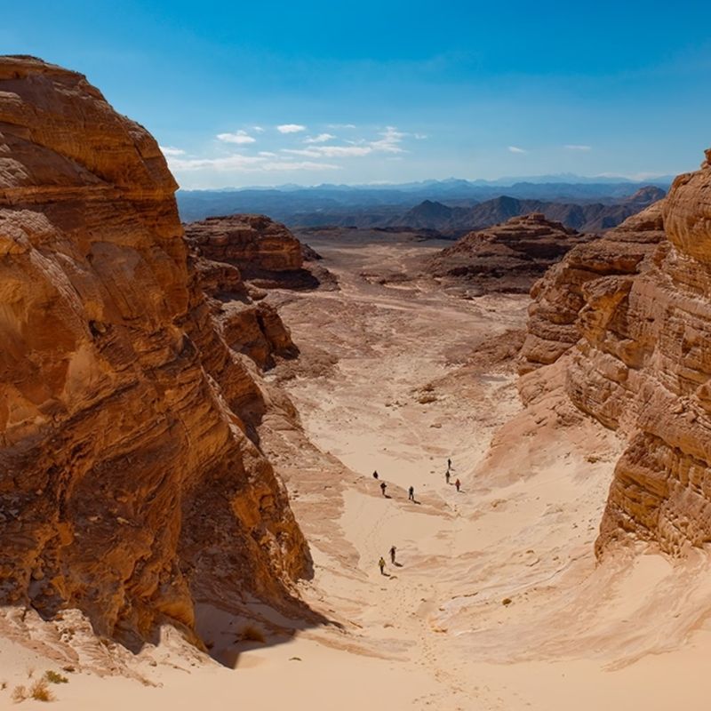 Experience the stark, rugged beauty of Egypt’s Sinai Desert with this captivating aerial image of its dramatic mountains, winding canyons and sweeping expanses of sand. From above, the landscape reveals a tapestry of warm earth tones, sharp ridgelines and ancient geological formations shaped by millennia of wind and time. The vast emptiness and sheer scale of the Sinai create a sense of solitude and timelessness, showcasing one of the Middle East’s most iconic desert environments.
Inspiration Africa designs tailor-made journeys to Egypt, offering travellers the chance to explore the Sinai’s breathtaking desert landscapes, rich Bedouin culture and unforgettable natural scenery from ground level and above.