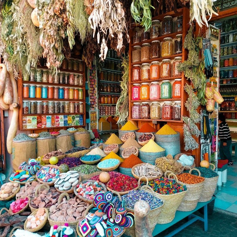 Experience the vibrant energy of Morocco with this captivating image of the Marrakech souk. The photo captures the bustling market’s narrow alleys, colorful textiles, handcrafted goods, and lively stalls, reflecting the rich culture and timeless traditions of the city. The interplay of light and shadow, combined with the vivid hues and textures, brings the souk’s dynamic atmosphere to life, offering a sensory glimpse into daily life in one of North Africa’s most iconic marketplaces.
Inspiration Africa designs tailor-made journeys to Morocco, giving travellers the opportunity to explore the souks of Marrakech, discover local crafts and cuisine, and immerse themselves in the city’s captivating culture and vibrant street life.
