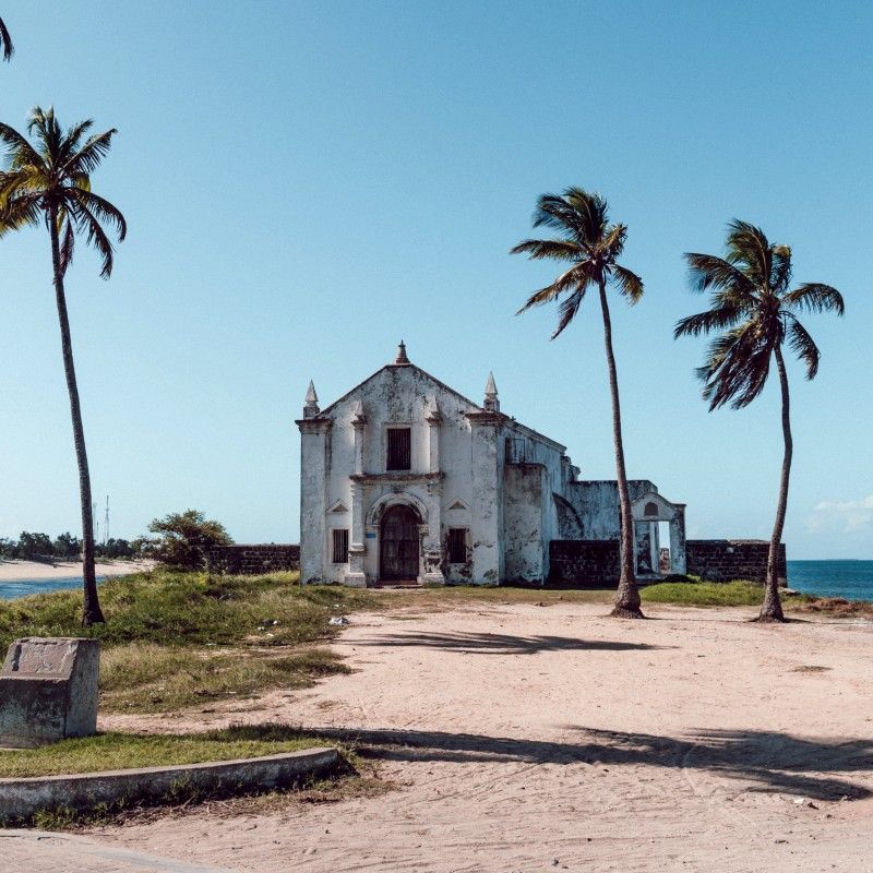 Gaze upon the historic Church of San Antonio on Ilha de Moçambique, Mozambique, captured in this striking photograph. The image showcases the church’s colonial-era architecture, set against the island’s coastal backdrop, reflecting centuries of Portuguese influence and the rich cultural heritage of this UNESCO World Heritage Site. Ilha de Moçambique, with its blend of history, architecture, and maritime significance, offers a unique window into East Africa’s past. Visiting this remarkable island provides an immersive journey through Mozambique’s vibrant culture and history. Inspiration Africa specializes in designing bespoke, tailor-made journeys that combine cultural exploration with extraordinary experiences across Africa’s most remarkable destinations.