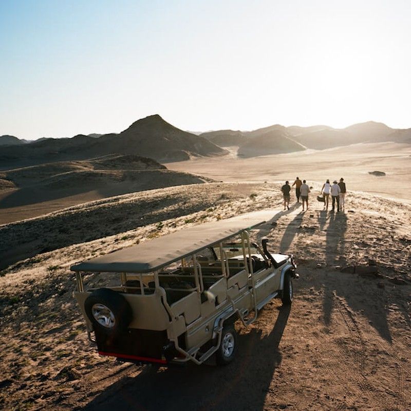 Enjoy a sunset drive through the vast, otherworldly landscapes of Kaokoland in Namibia, where rugged mountains and desert plains glow in golden light. Pausing for a classic sundowner drink, surrounded by silence and space, is an unforgettable way to experience this remote wilderness. Inspiration Africa specializes in bespoke, tailor-made journeys to Namibia and across Africa, crafting extraordinary safari and adventure experiences in remarkable destinations.
