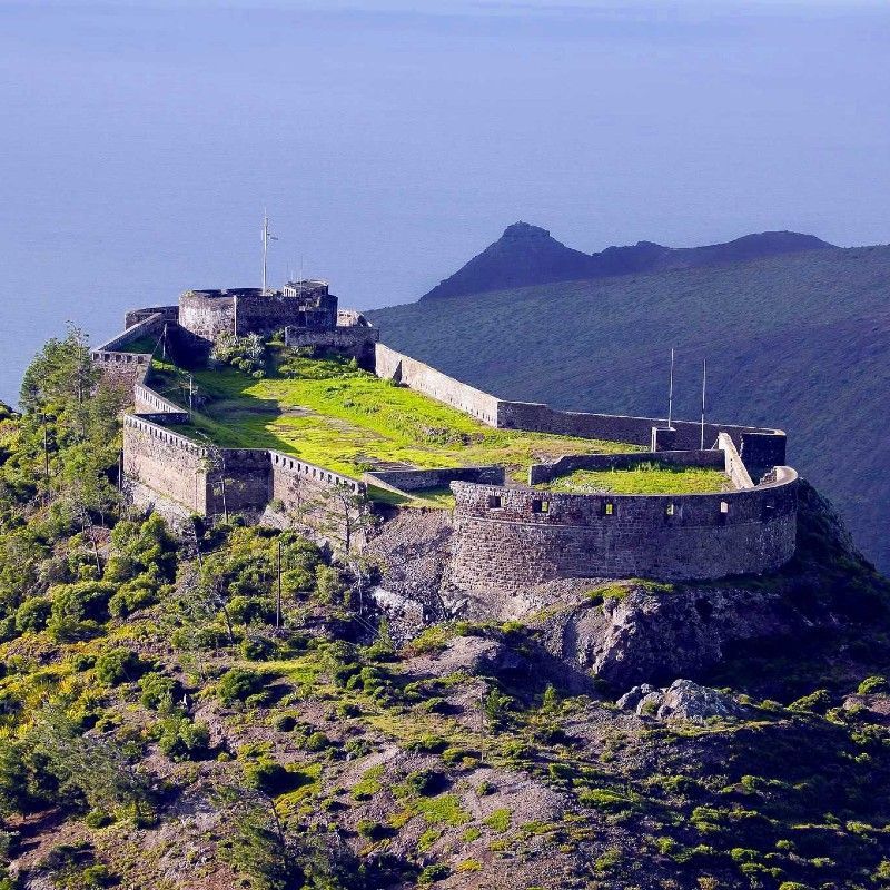 Admire the historic fort on Saint Helena Island, its stone walls standing proudly against the rugged landscape and deep blue Atlantic backdrop. This striking scene captures the island’s rich heritage, dramatic scenery, and timeless sense of remoteness. Exploring such iconic landmarks offers a rare glimpse into one of the world’s most fascinating and isolated destinations. Let Inspiration Africa design your bespoke, tailor-made journey to discover the wonders of Saint Helena. Start planning your extraordinary Atlantic adventure with us today!
