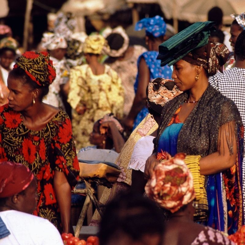 Bustling market day in Dakar, Senegal, with vibrant stalls, fresh produce, and lively street scenes—an authentic cultural experience curated by Inspiration Africa.